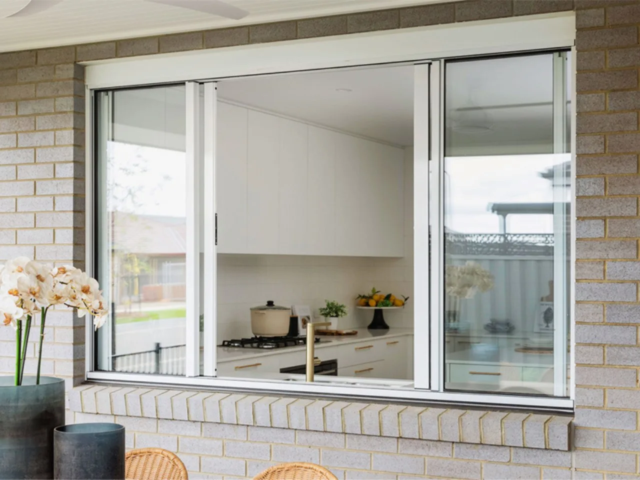 Aluminium sliding window serving a kitchen